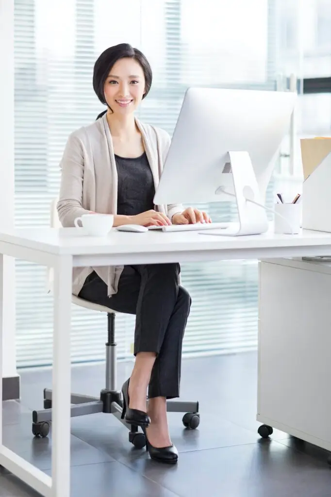 Portrait of young woman in office